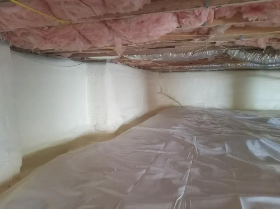 Crawl space encapsulation with closed-cell spray foam for Commercial Roof Restoration in Homewood